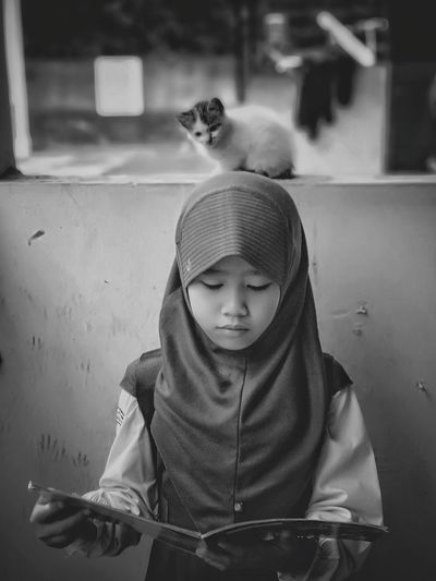 Little girls studying together