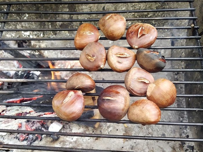 High angle view of eggs on barbecue grill