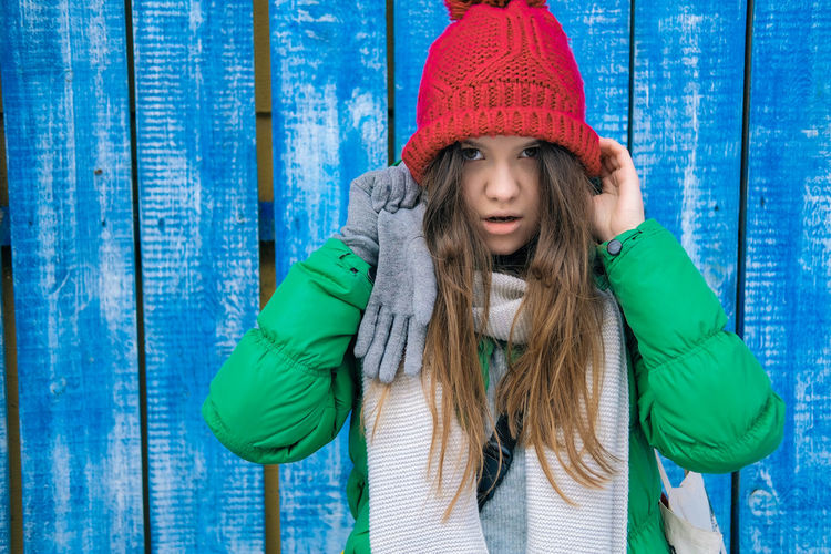 Portrait of teenage girl in snow