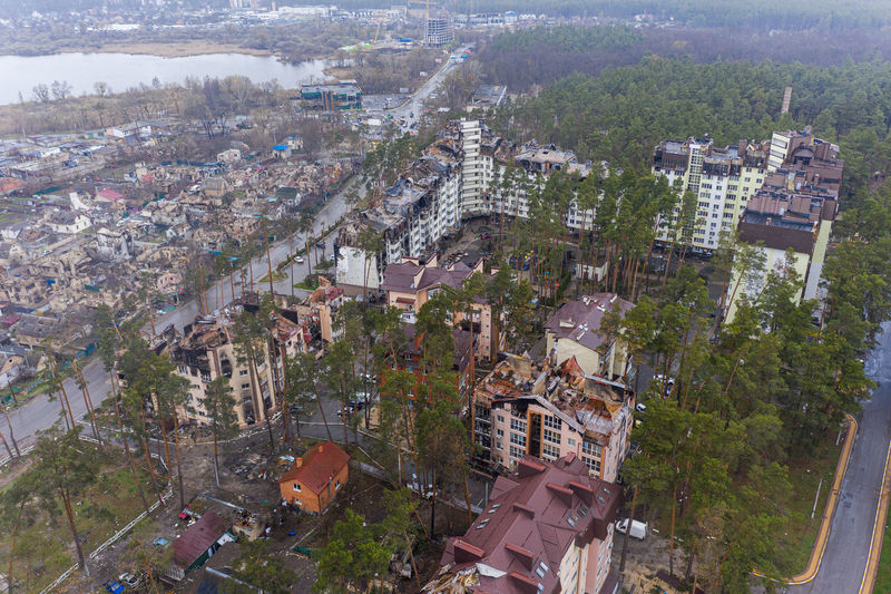 The aerial view of the destroyed and burnt buildings.