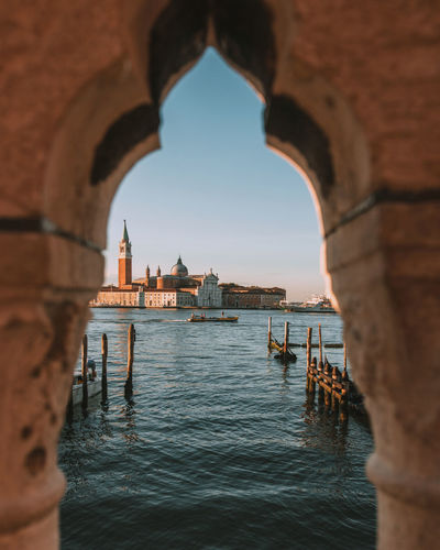 Sea seen through arch of building