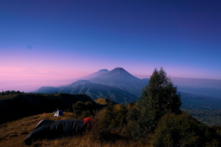 Scenic view of landscape against sky during sunset at mount prau, indonesia