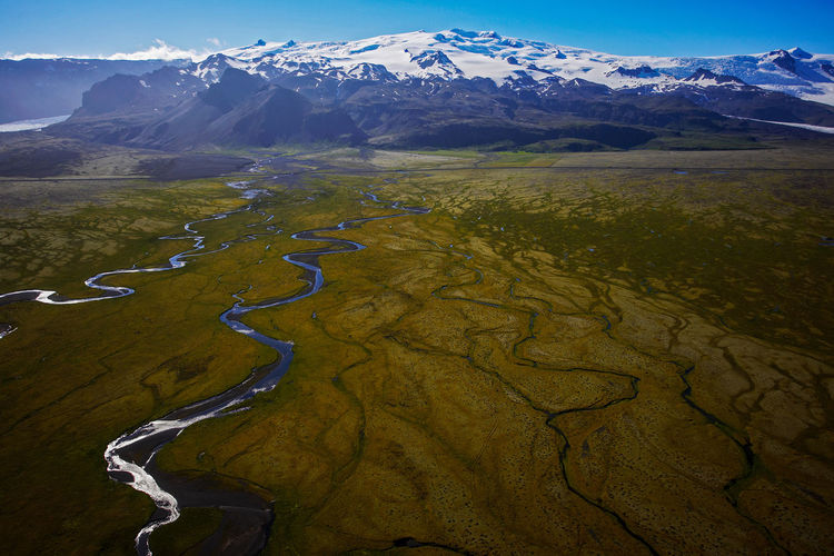 Aerial shot of meandering glacier rivers in south iceland