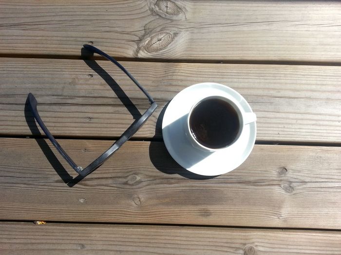 Coffee cup on wooden table
