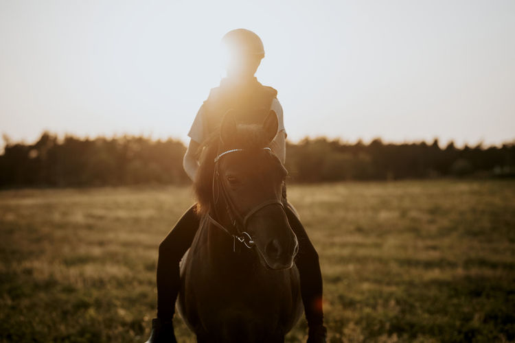 Girl horse riding