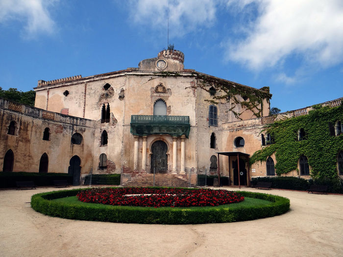 View of historical building against cloudy sky