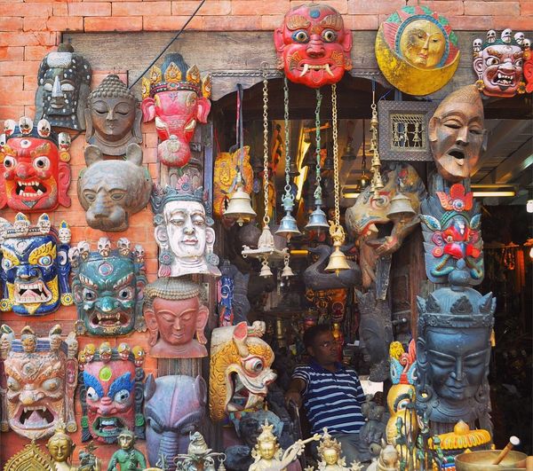 Close-up of statues for sale