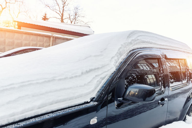 Car on snow covered landscape