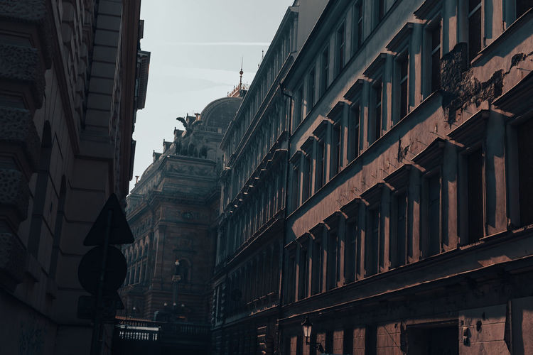 Low angle view of buildings against clear sky