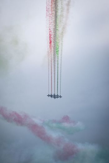 Low angle view of airplane flying in sky