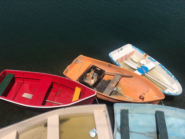 High angle view of boats moored by lake