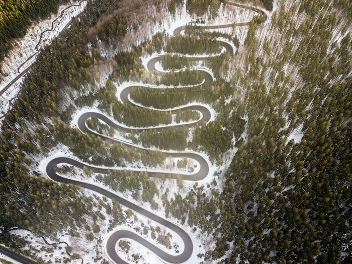 High angle view of road signs on snow covered land