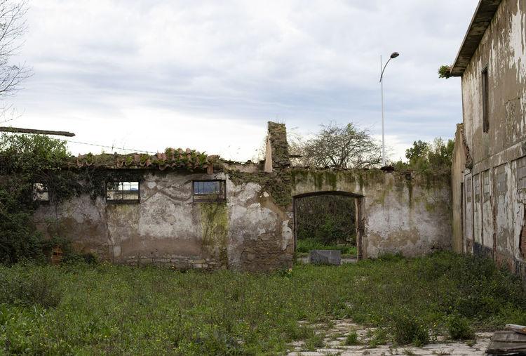 Abandoned building against sky