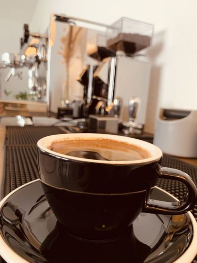 Close-up of coffee cup on table