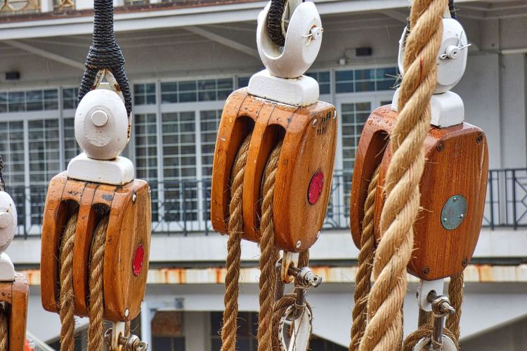 Close-up of ship rigging with pulley and rope