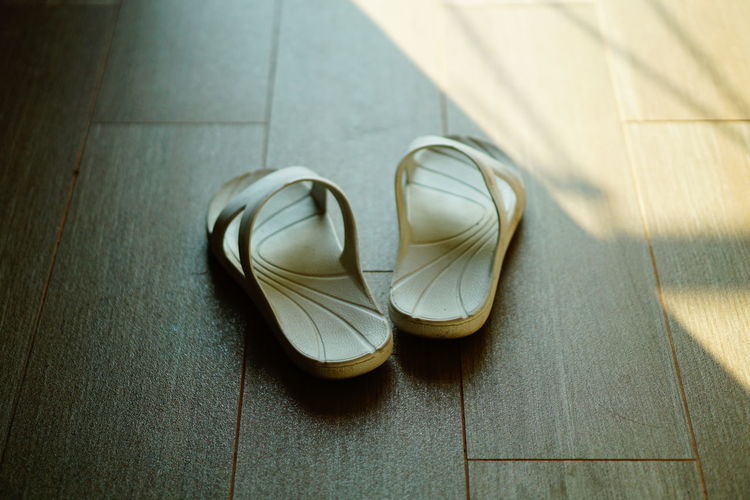 High angle view of shoes on floor