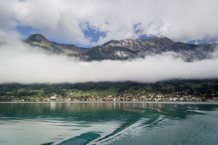 Low cloud over lake brienz with the mountains peeking above the cloud