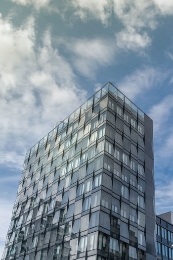 Low angle view of modern building against sky