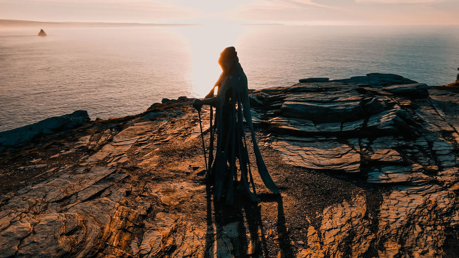 Aerial view around the monument to king arthur in britain monument close up on sea background.