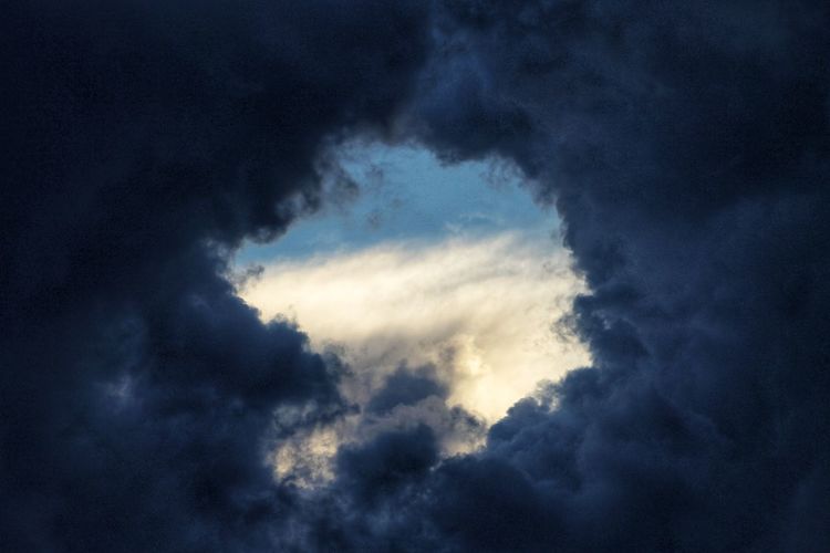 Low angle view of storm clouds in sky, heaven's door