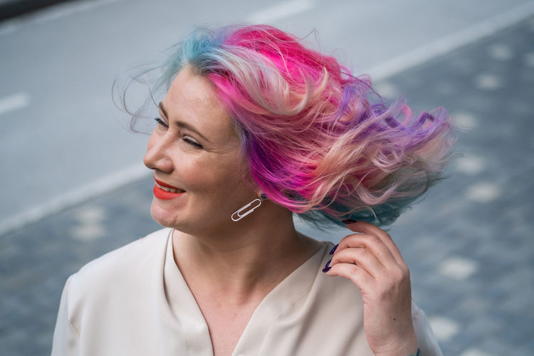 Portrait of woman with pink hair