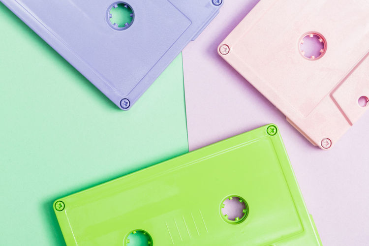 Colorful audio cassettes on colored background
