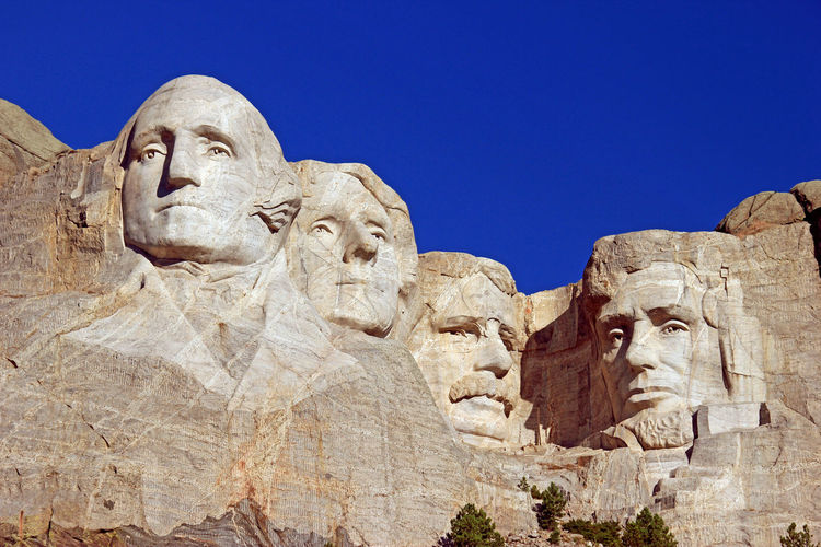 Low angle view of mt rushmore national monument against clear sky