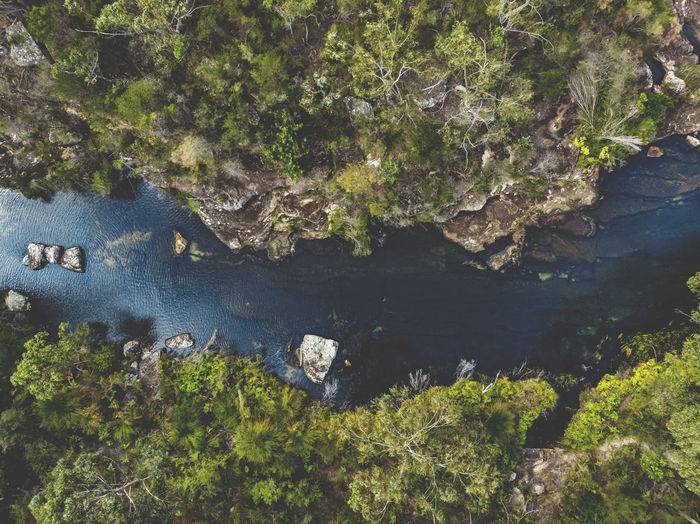 High angle view of stream amidst rock formation