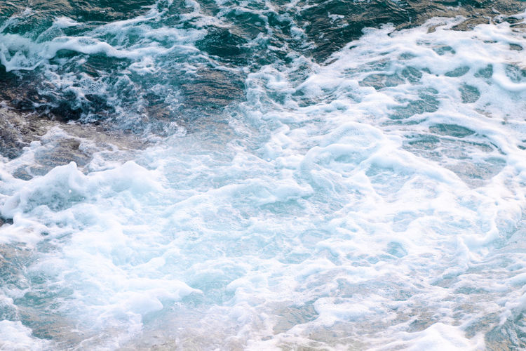 Sea water foam, top view, abstract nature background.