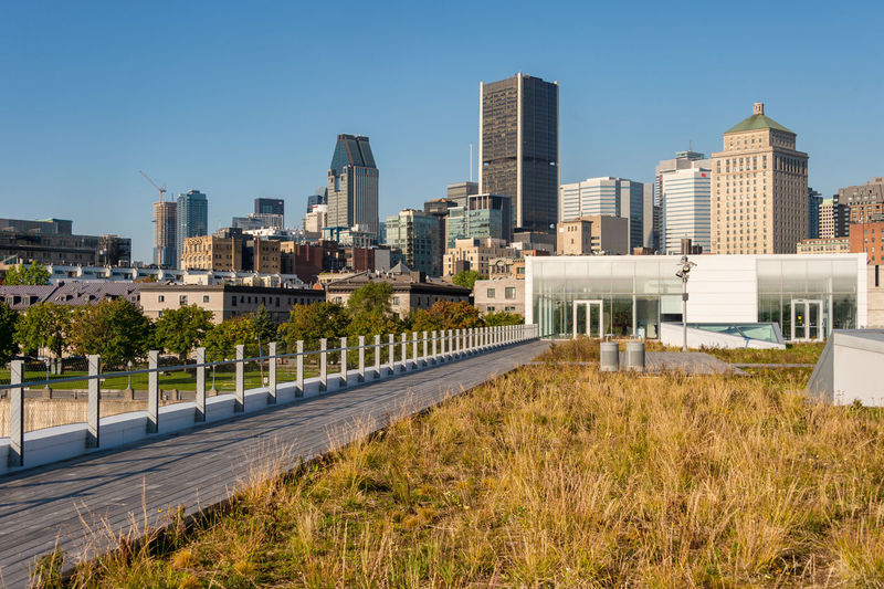 View of modern buildings against clear sky