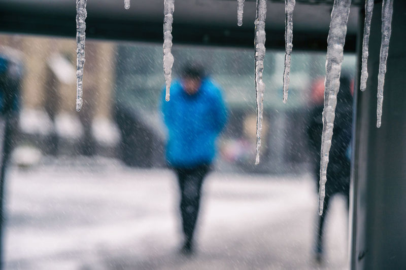 Defocused image of man standing outdoors