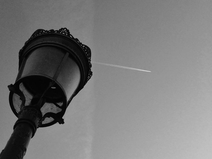 Low angle view of street light against sky