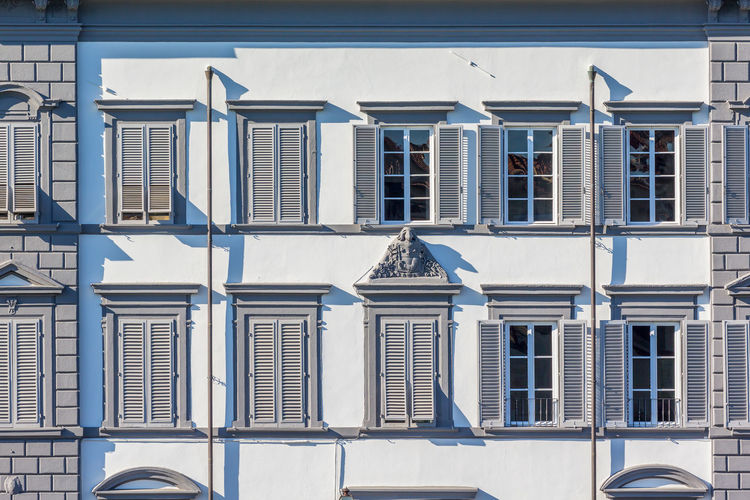 Window with shutters on the apartment building