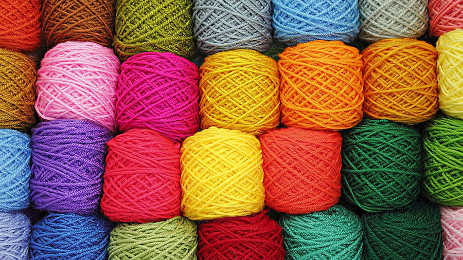 Full frame shot of colorful wool balls for sale at store
