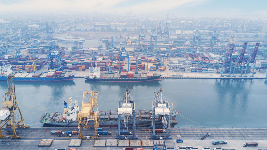 High angle view of commercial dock by sea
