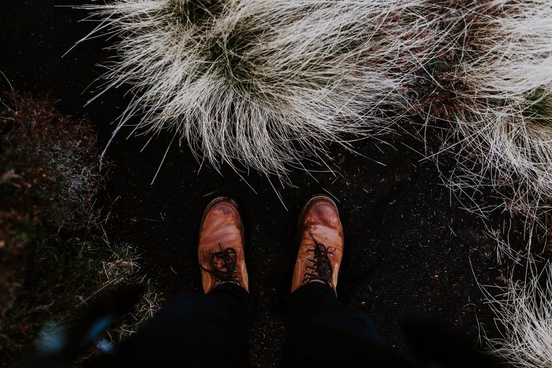 Low section of person standing on ground