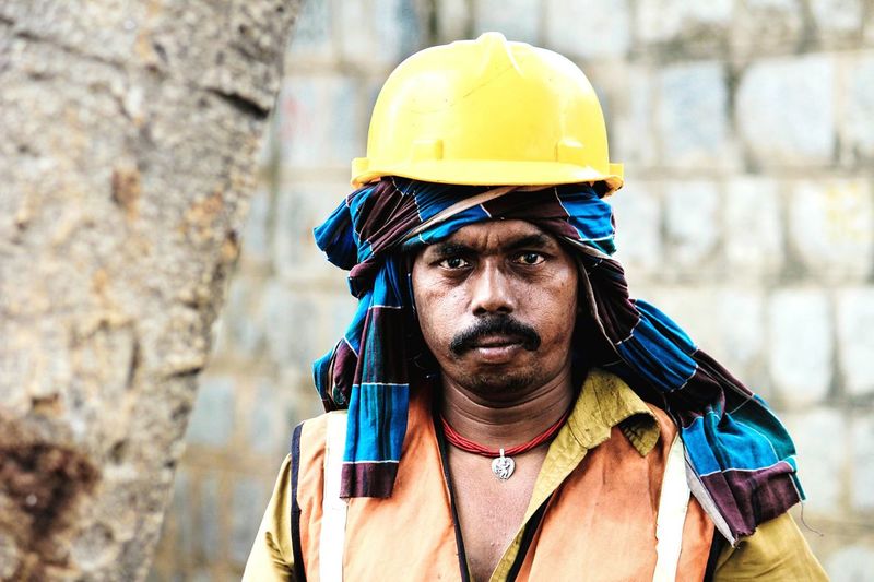 Portrait of construction worker wearing hardhat