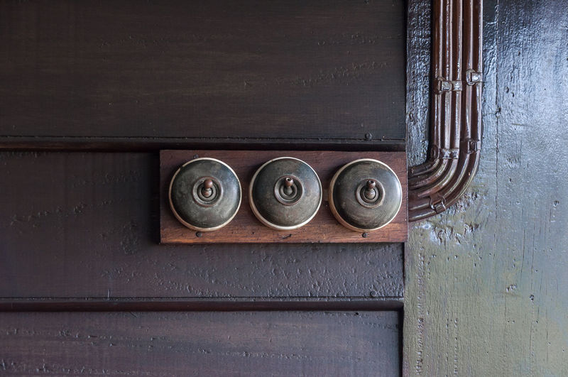 Close-up of doorbells