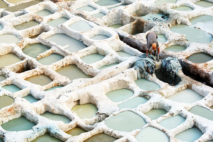 High angle view of man working at the tannery