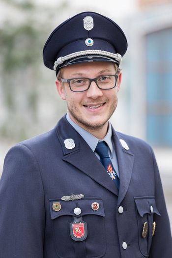 Portrait of man wearing uniform