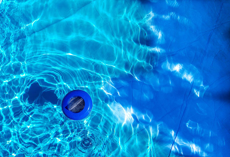 High angle view of cleaner in swimming pool