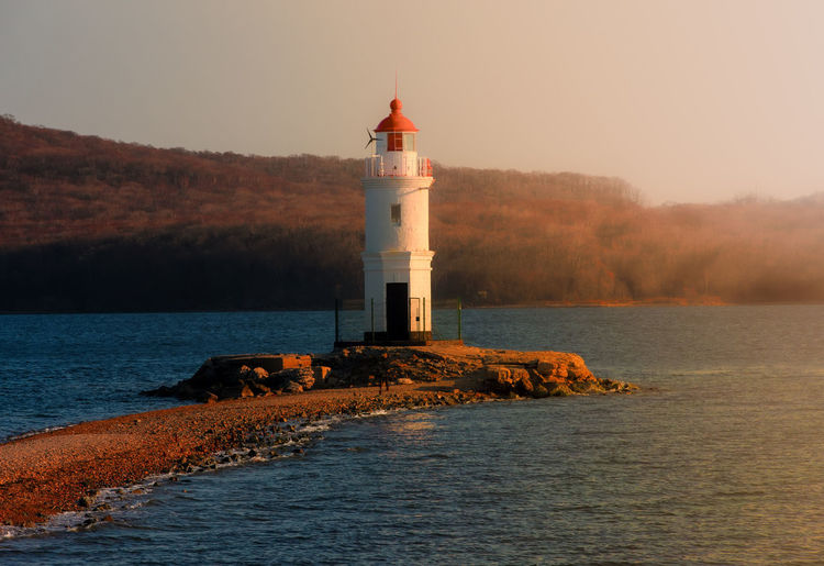 The lighthouse tokarevskaya koshka with vane anemometer in vladivostok, russia
