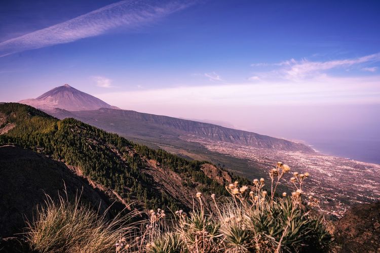 Scenic view of landscape against cloudy sky - tenerife island - view to the pico del teide 
