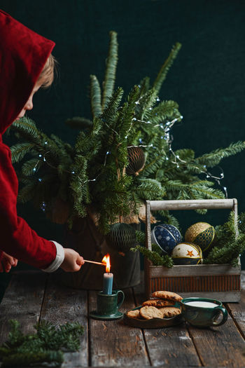 Cropped hand of person preparing food