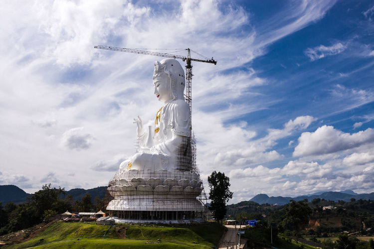 Buddha statue against sky at wat huai pla kung