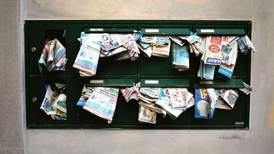Waste paper in mailboxes
