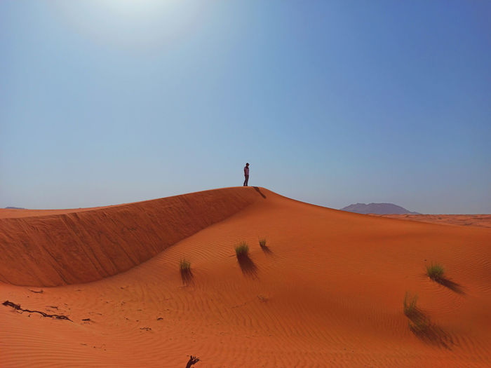 Alone in the desert under a clear sky
