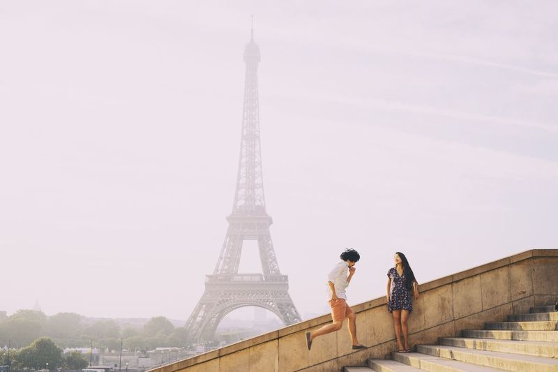Couple in front of eiffel tower