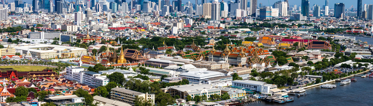 Panorama aerial view of temple of the emerald buddha, wat phra kaew and bangkok city in the morning