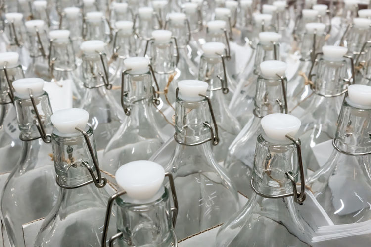 High angle view of white lid bottles